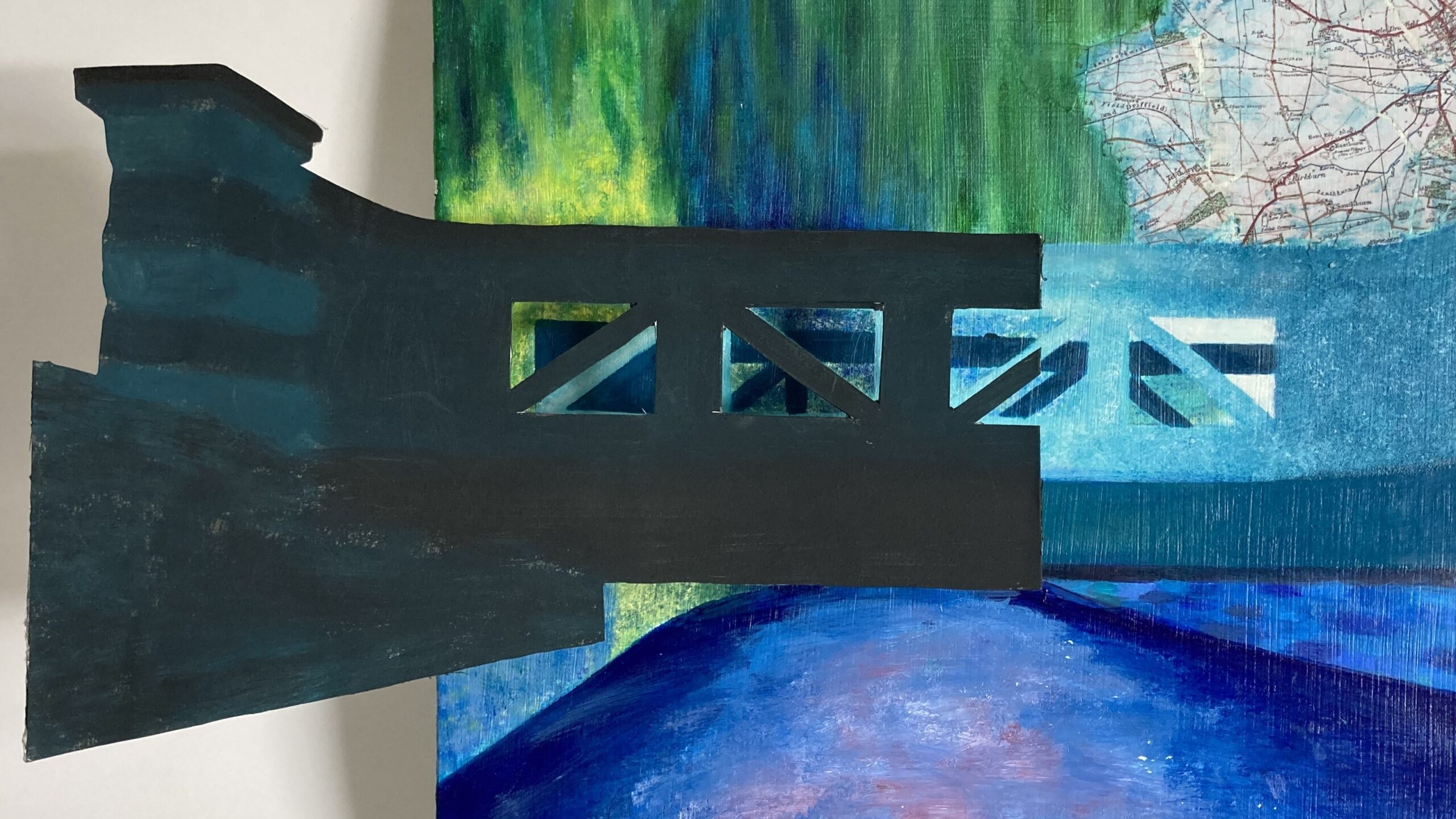 Detail of: A square canvas with a painting of a bridge, overlaid with a collaged bridge, which extends beyond the canvas to the left. The bridge is two shades of blue. The background is partly painted, with blue and green, and partly collaged with a map.