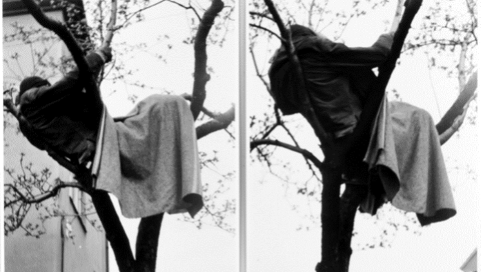 Two black and white photographs of the artist Petr Štembera performing their action of sleeping in a tree