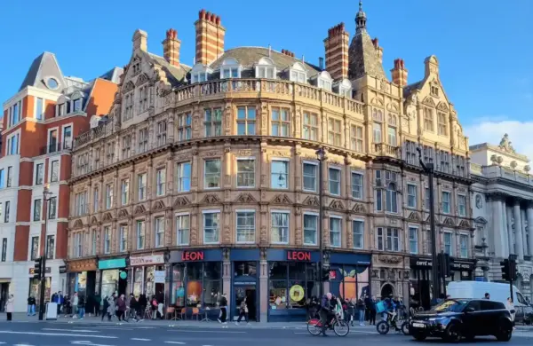 view of dutchy house's facade from the opposite side of the road