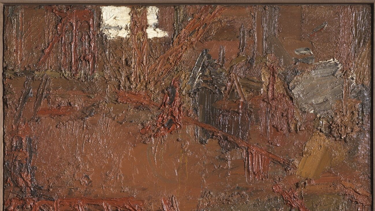 The painting offers a disorienting scene of partially constructed floor levels, jutting beams and extremes of light and dark. Auerbach’s use of red throughout the work gives fiery intensity to the painting, as if we are witness to an intense, almost hellish, vision.