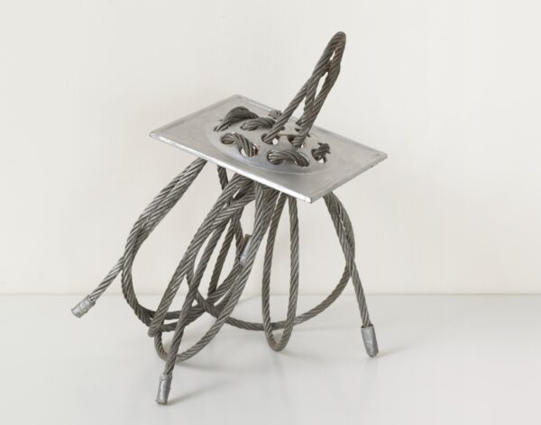 Alice Adams (b. 1930), Threaded Drain Plate, 1964, Steel cable through perforated drain plate, 47 × 20.3 × 26.7 cm, Zürcher Gallery, New York. Courtesy of the artist and Zürcher Gallery, New York / Paris. © Howcroft Photography, Boston.