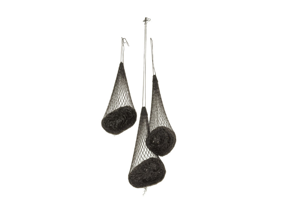 Sculpture with three dark nets hanging