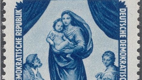 A vintage blue postage stamp from the German Democratic Republic depicting Raphael’s Sistine Madonna. The design shows the Madonna holding the Christ Child, flanked by saints, with draped curtains framing the scene. The stamp is marked 