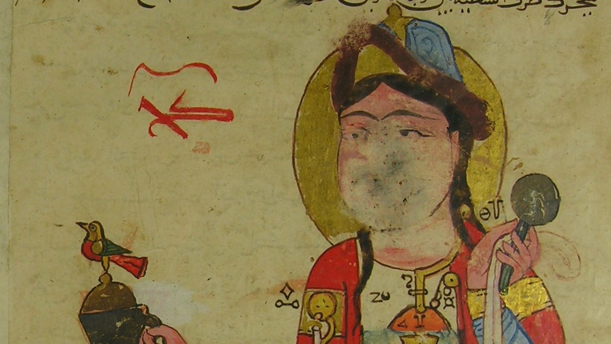 Medieval Ottoman Illustration of a liquid-dispenser shaped as an enslaved servant, from Ibn al-Razzaz al-Jazari’s Compendium of the Mechanical Arts (1206, Amid, Turkey). The automaton figure wears a red robe and gold boots, holding a vessel with a bird on top, with pipes and mechanisms connecting to a cup. Folio 121v, Topkapı Palace Library, Istanbul (Ms. Ahmet III 3472).