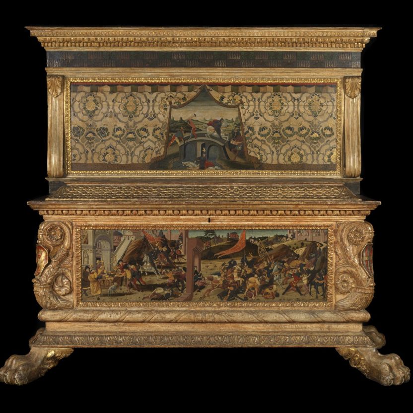 The Morelli-Nerli cassoni wedding chest includes intricate details such as coats of arms on the corners of each chest.  