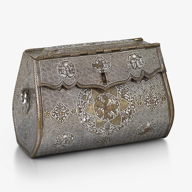 An intricate, oblong-shaped metal bag with front-closure. There are detailed illustrations at regular points across the front, and gold and silver inlays.
