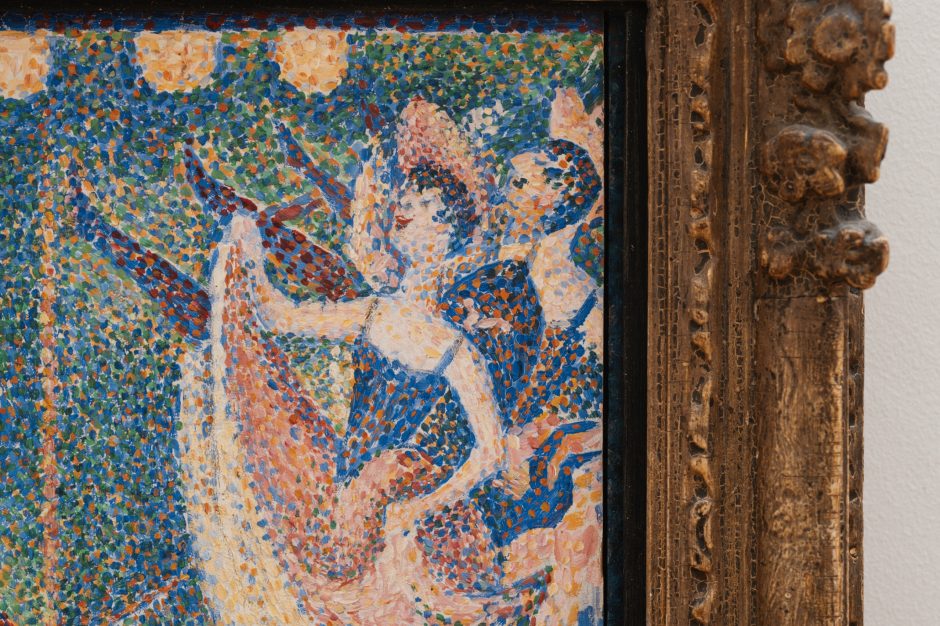 Close up of a pointillist painting showing two dancers