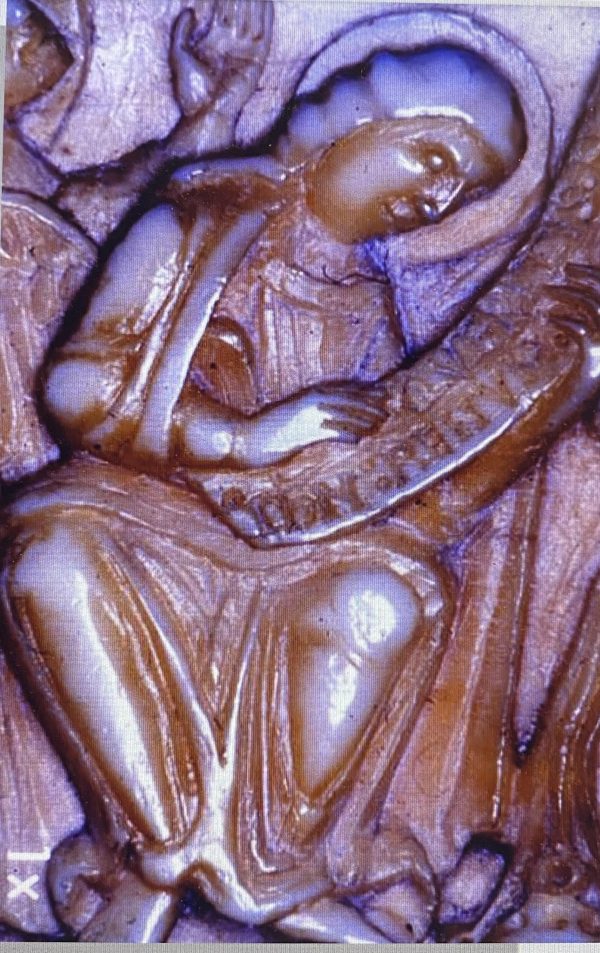 Detail of an Angel, Cloisters Cross, dated here ca. 1150–60, walrus ivory.