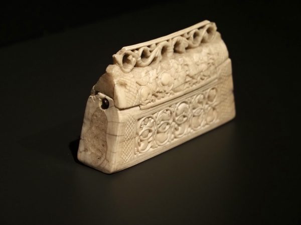 Purse reliquary, ca. 1125, walrus ivory, 7.7 x 13.4 x 2.8 cm.