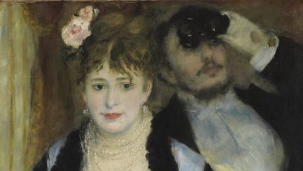 A woman looks out from an opera box