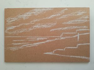 a drawing in progress of a beach landscape using pointillist technique.