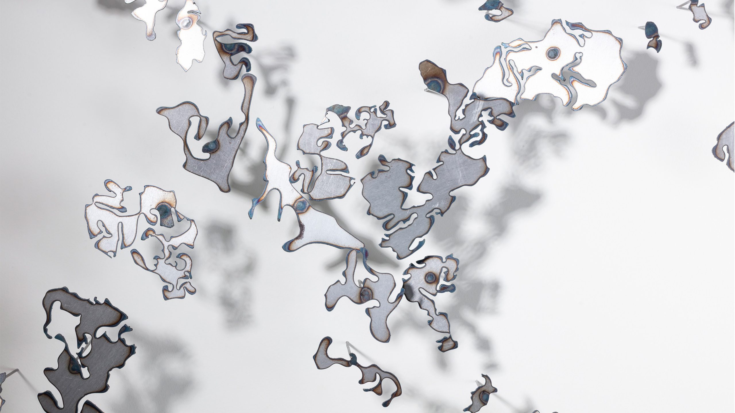 abstract pieces in silver/grey