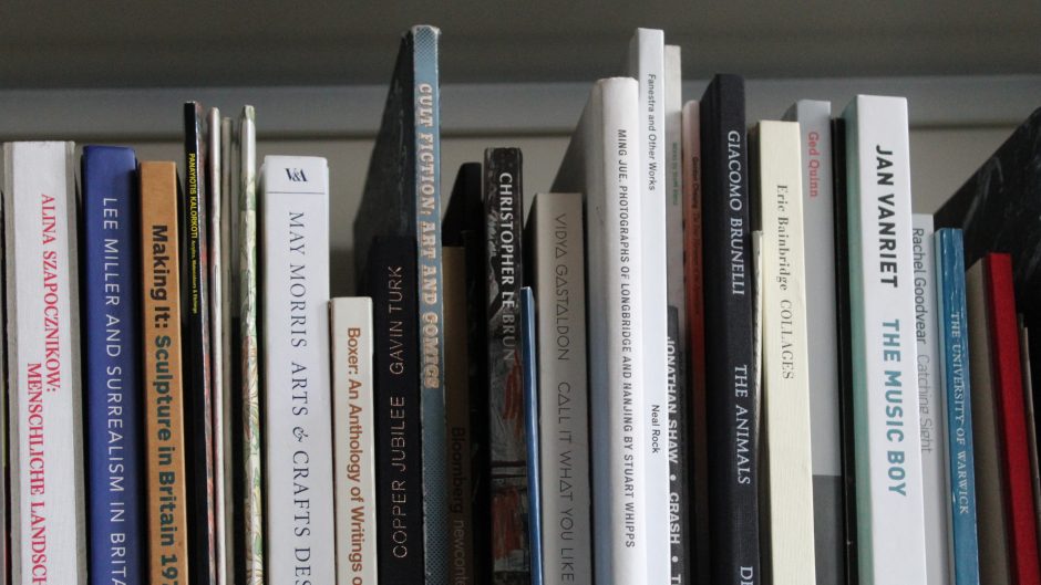 Rows of art history volumes on the shelves of the Courtauld Library.