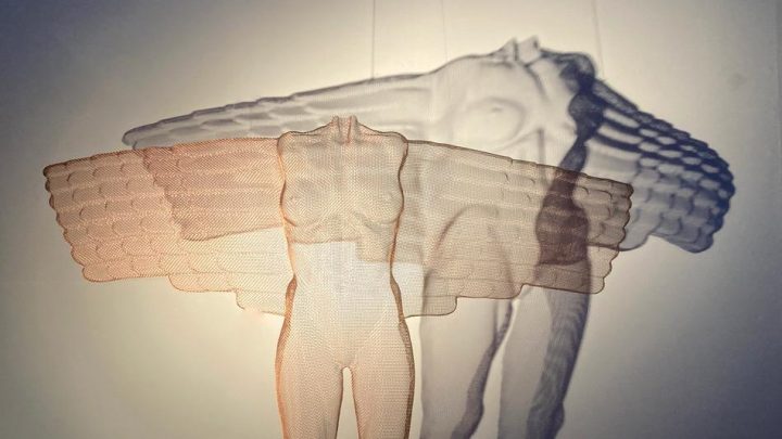 An image of an artwork featuring two figures surrounded by a shadow
