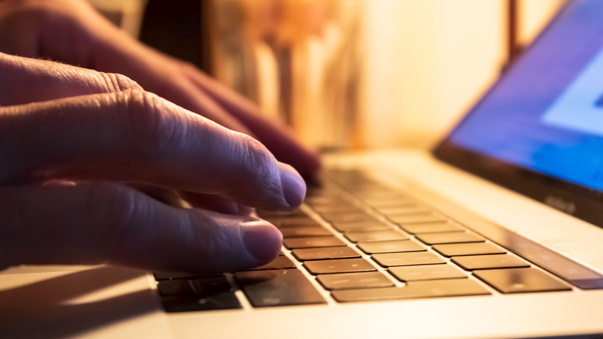 typing on a laptop
