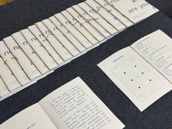 Catalogues spread out on a blue table