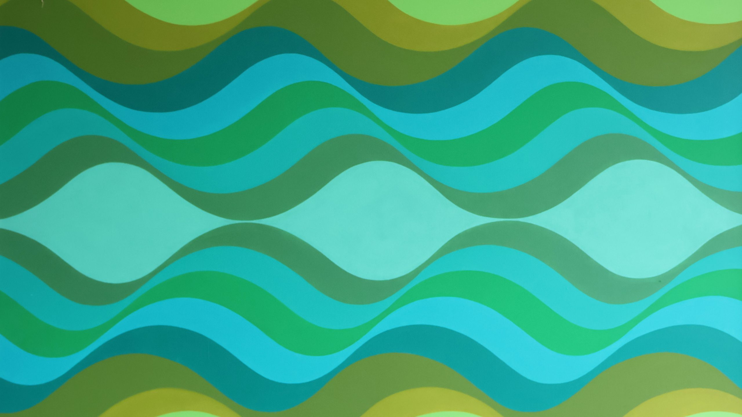 Abstract painting in waves of green and blue.