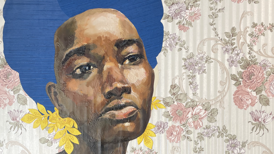 A portrait of a Black woman with large earrings like leaves and wearing a blue cami top. She has a pensive look on her face. She is against a floral wallpaper background; the pattern of the wallpaper is subtly in relief on her skin.