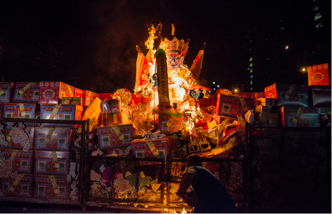 A burning effigy at the Hungry Ghost Festival in Singapore