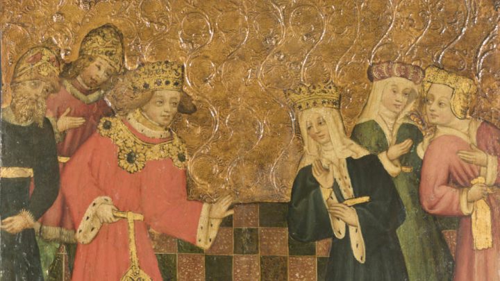 An ornate golden panel depicting two groups of figures wearing ornate medieval clothing, headdresses and crowns. In the centre, a woman and man seem engaged in a conversation; the woman leans towards him, her hand raised. The man reaches for her. Behind them, people watch and talk.